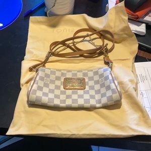 Louis Vuitton Eva clutch Inventeur